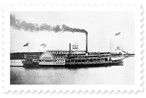 A black-and-white photograph of a steamboat transporting mail.