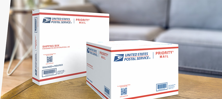Two Priority Mail International® boxes sitting on a table.